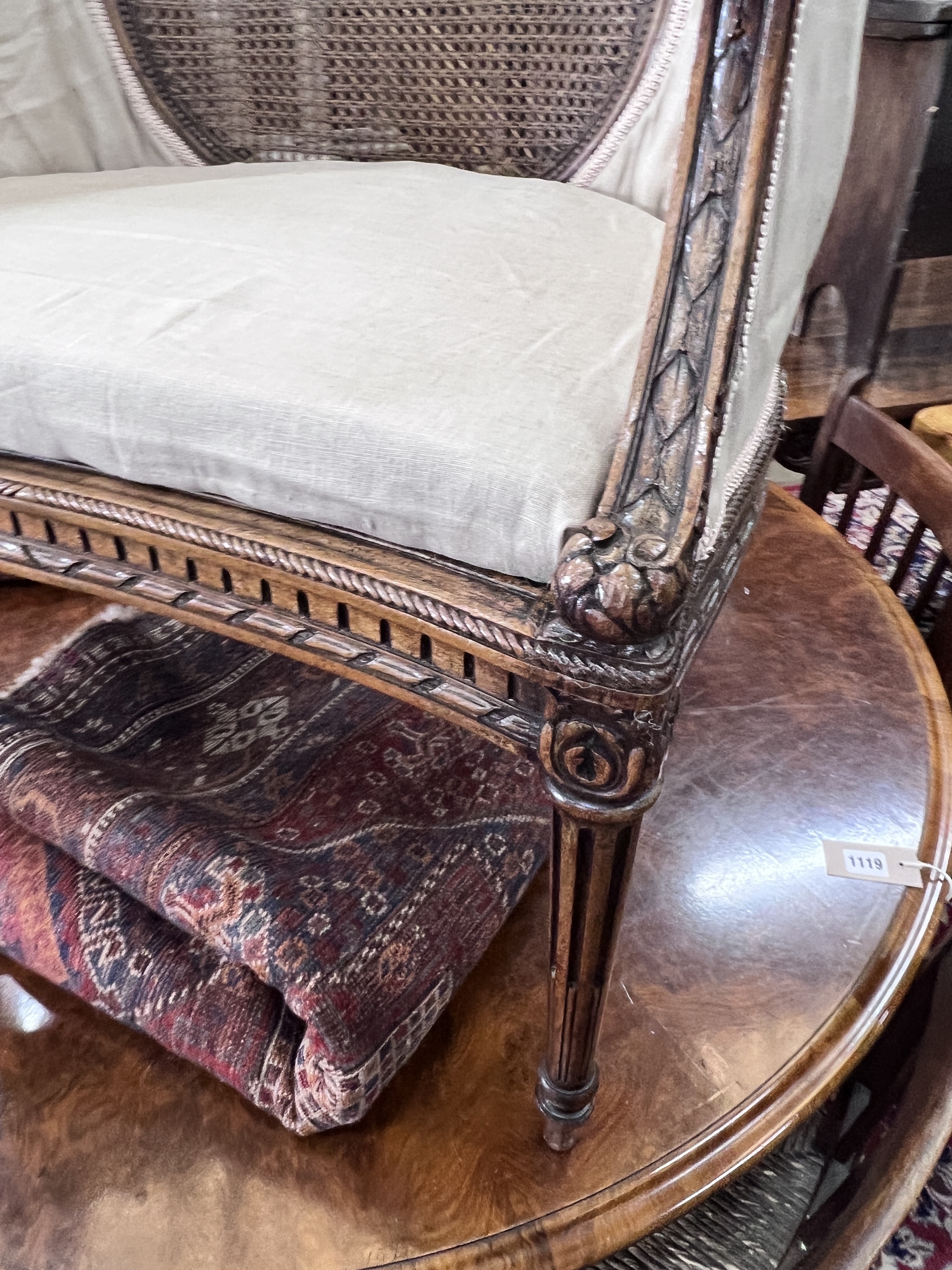 A Louis XVI style caned beech tub framed side chair